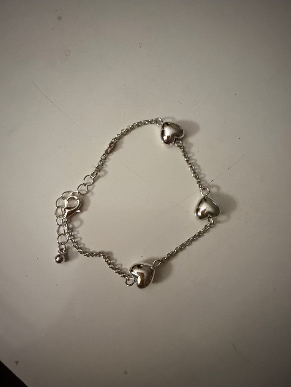 Bracelet with 3 hearts in silver colour